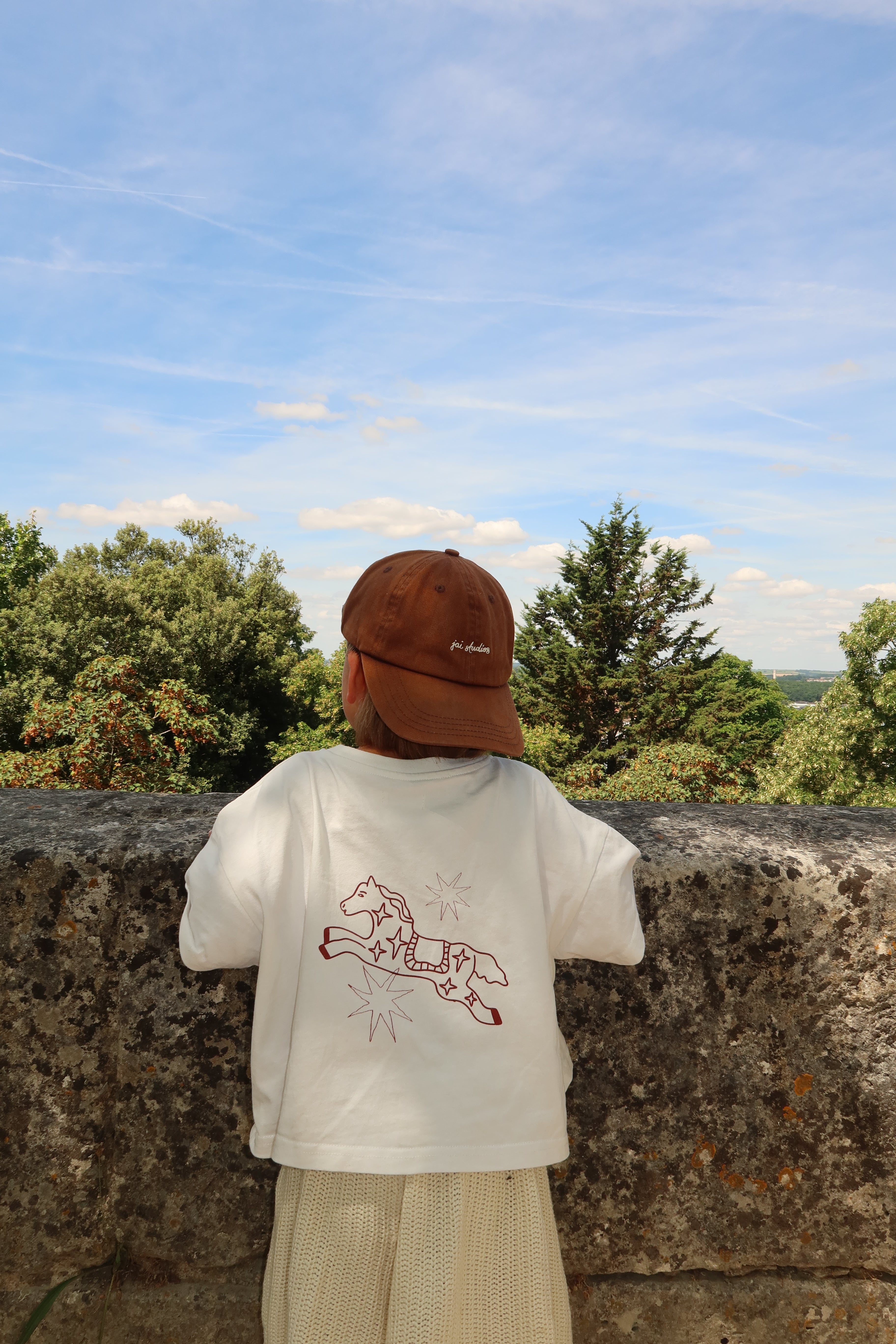 Jai Studios Sol Tee in natural fabric, front view showing round neckline and casual fit, lightweight and comfortable summer t-shirt.